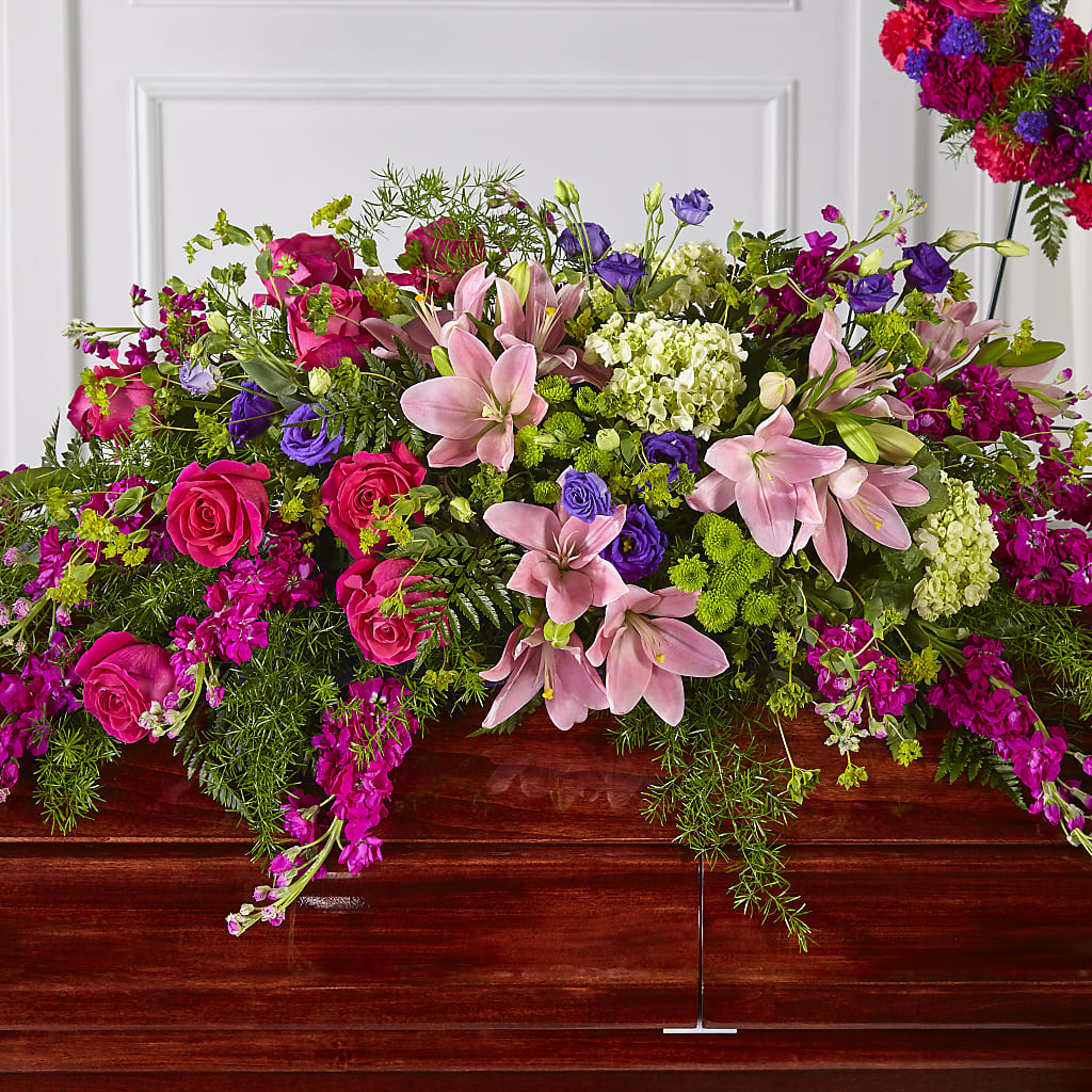Radiant Tribute Casket Spray – Abell Flower Shop, Abernathy TX